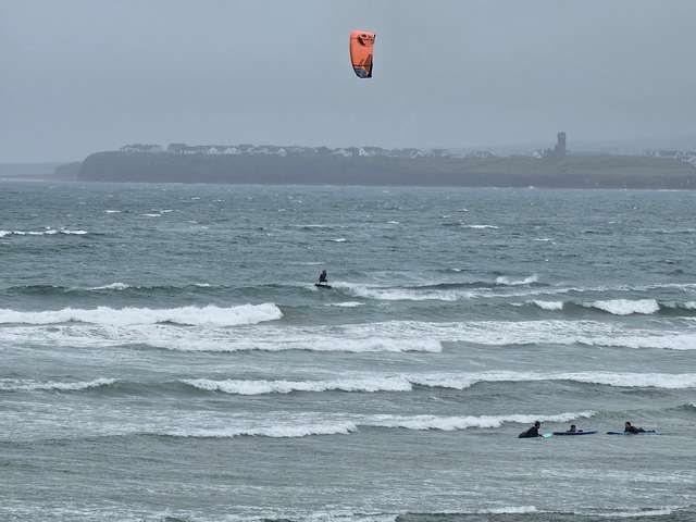 Kite surfer making the most of the wind